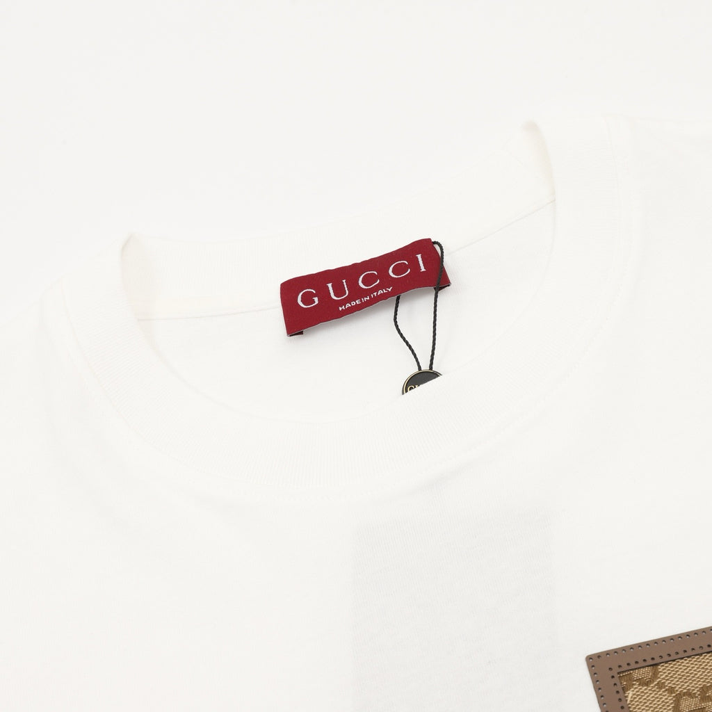 GUCCI ポケット、フローラルパッチ付き半袖シャツ